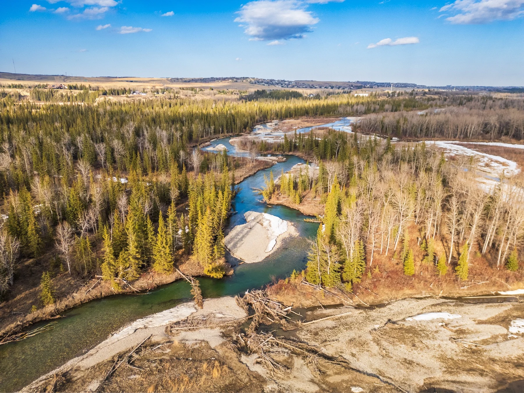 The river setting photographed for 415 Clearwater Landing in Elbow Valley