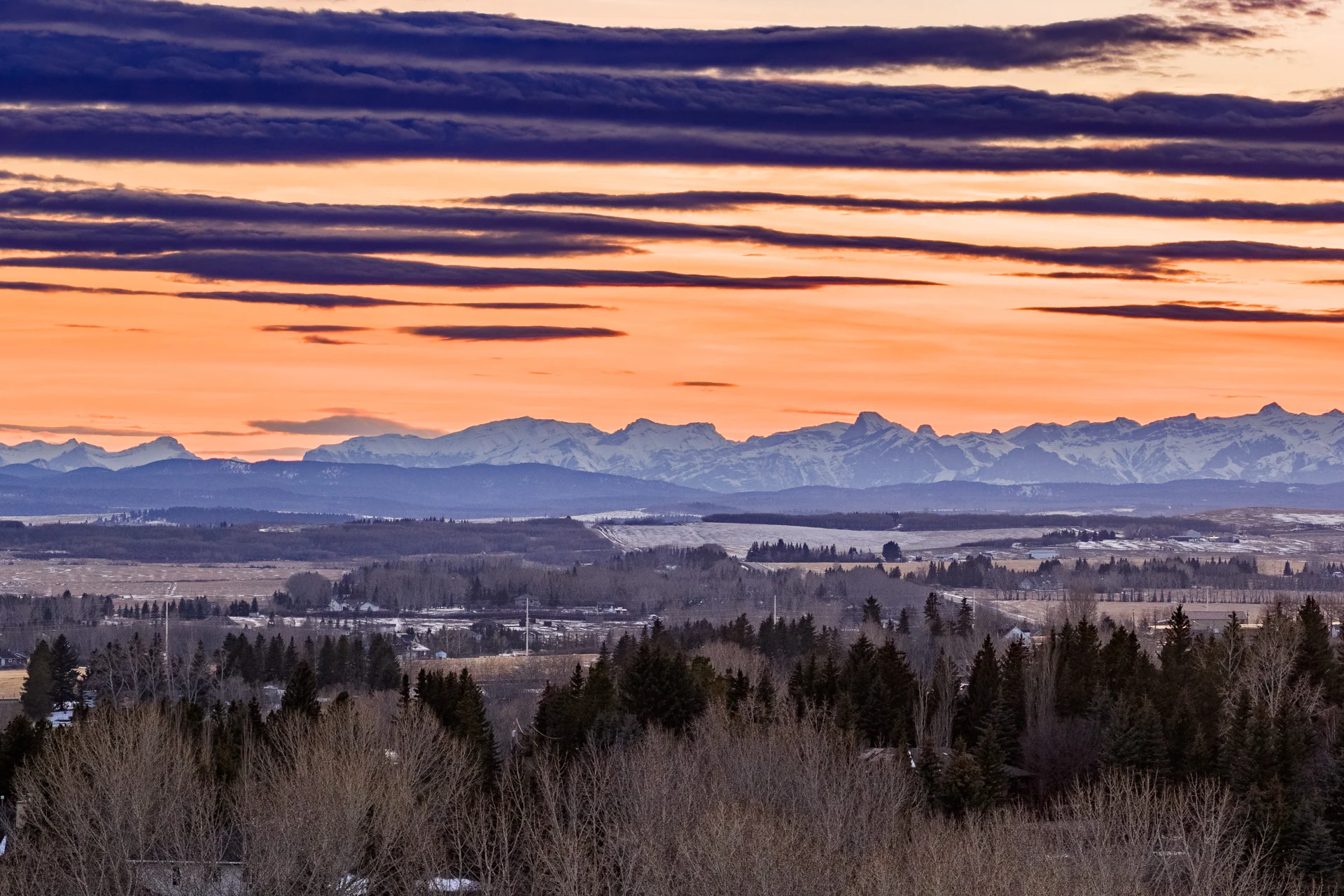 Sunset over the Rocky Mountains as photographed for 3 Spring Meadows Lane